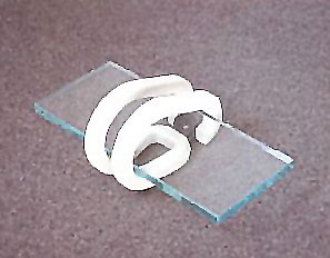 Almandrade: Objeto / ferro, vidro, bola de gude - (20x11x07cm).